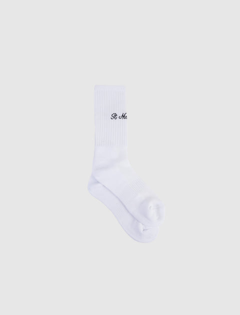 White crew socks with "It Me" black text embroidery, streetwear apparel on white background