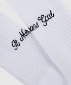 White ribbed crew socks with black script text embroidery detail