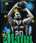 Graphic black t-shirt featuring a basketball player print, stats, colorful stars, bold Manu text.