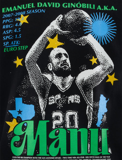 Graphic black t-shirt featuring a basketball player print, stats, colorful stars, bold Manu text.