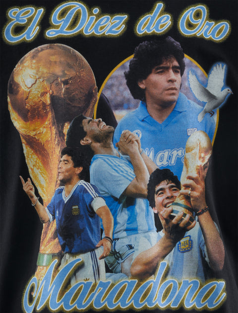 Black streetwear shirt featuring soccer legend collage, World Cup trophy, and a dove graphic.