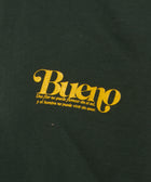Dark green streetwear t-shirt with yellow Bueno script and Spanish quote graphic detail