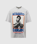 Gray streetwear t-shirt with bold graphic of boxer, vintage sports-inspired design, short sleeve