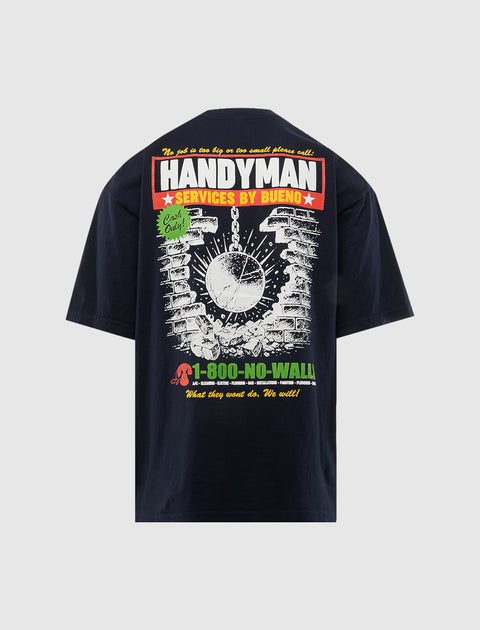 Back of black graphic streetwear t-shirt with handyman service design and colorful print.