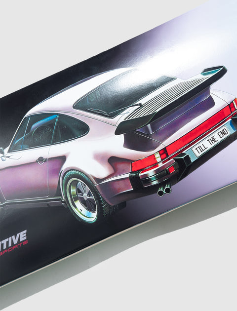 Skateboard deck with artwork of classic sports car and 'TILL THE END' license plate