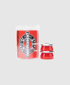 Red conical skateboard bushings with washers, packaged in clear plastic container