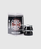 Black skateboard bushings and washers with branded packaging on a light background