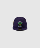Purple snapback hat with embroidered SUPERVSN Studios logo and colorful patch on front