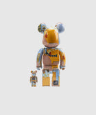 Two collectible bear-shaped art toys with colorful paint and 'Vincent' text, standing on white background