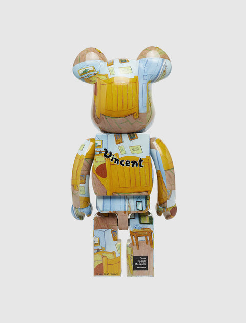 Bearbrick toy with Van Gogh art print and 'Vincent' text on the back, white background