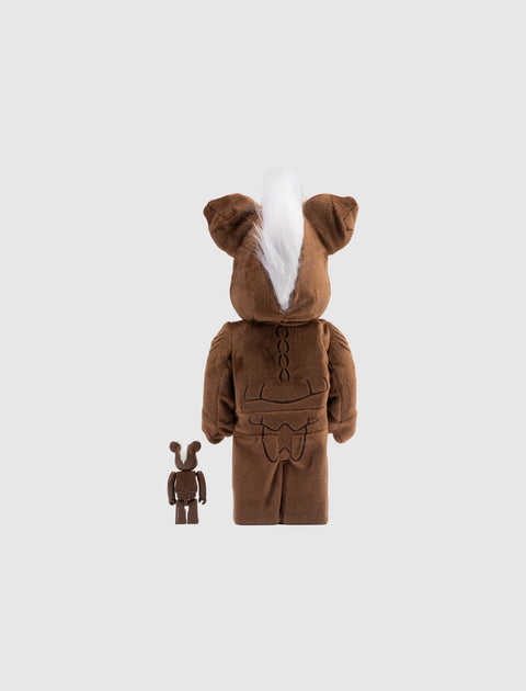 Brown plush and vinyl collectible bear figures with white hair detail, shown from the back