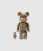 Two multicolor Bearbrick art collectible figures with collage graphic prints on white background
