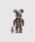 Colorful collectible bear figures with cartoon graphic patterns on plain background