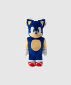 Blue cartoon hedgehog plush toy with red shoes and white gloves on plain background