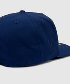 navy blue LA embroidered baseball cap, men's streetwear, side view