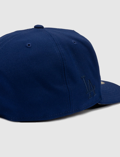 navy blue LA embroidered baseball cap, men's streetwear, side view
