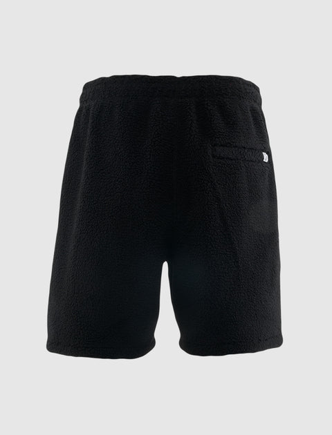 Men's black fleece shorts with elastic waistband and back pocket, streetwear style