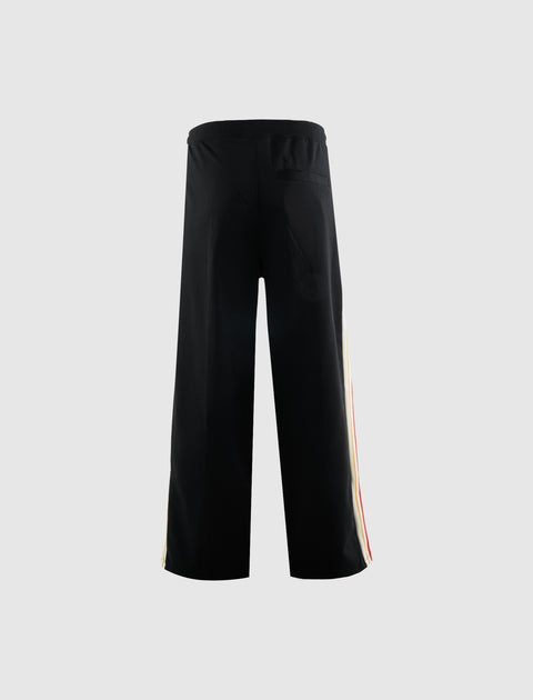 Black wide-leg track pants with side stripes and single back pocket, rear view