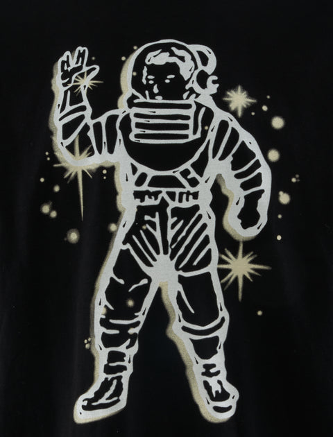 Graphic print of astronaut in space suit with stars on black fabric