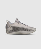 Gray low-top sneaker with mesh panel and textured side sole on white background