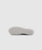 Translucent rubber outsole of a men's streetwear sneaker shoe, shown from bottom view