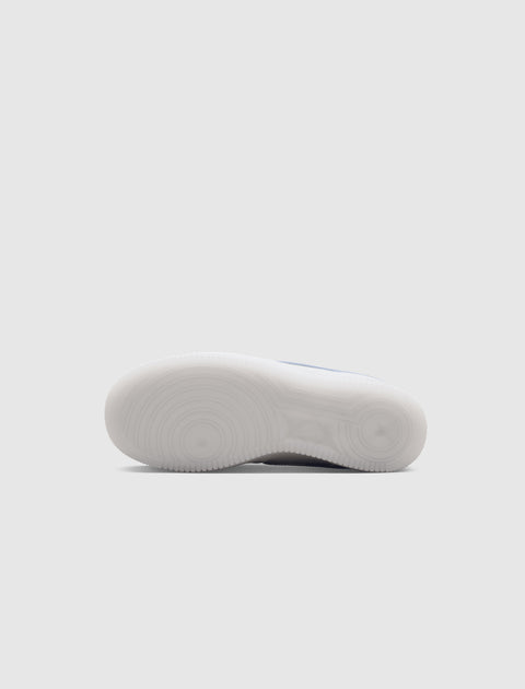 Translucent rubber outsole of a men's streetwear sneaker shoe, shown from bottom view