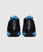 Back view of black and blue suede sneakers with silver 23 and Jumpman logos
