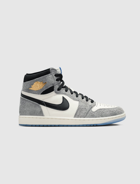 Grey and white high-top sneaker with black swoosh, gold logo detail, black laces