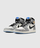 High-top sneakers with grey textured suede, white leather panels, black swoosh, and blue accents