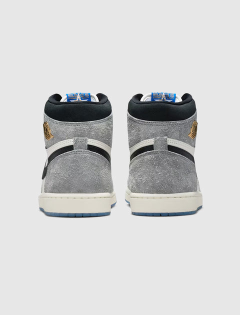 Rear view of high-top grey and black suede sneakers with gold logo detailing