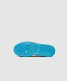 Blue Nike sneaker sole with circular tread pattern on a white background