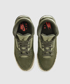 Olive green Nike Air sneakers with suede uppers and patterned midsoles, top view