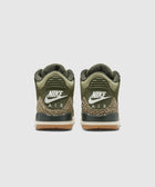 Back view of olive green Nike Air sneakers with camouflage and gum soles