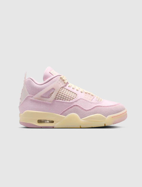 Light pink and cream suede sneaker with mesh panels, visible air sole, side view on gray background