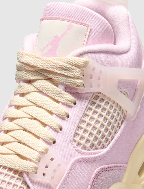 Closeup of pink and cream mesh sneaker with cream laces and pastel detailing