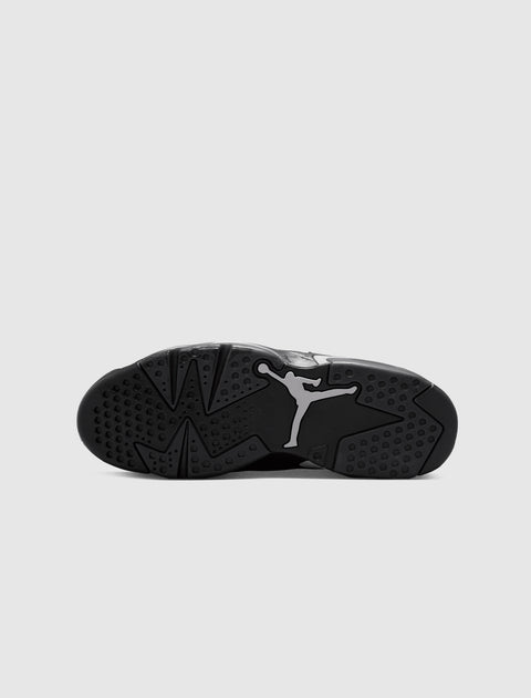 Black sneaker outsole with Jumpman logo, detailed grip pattern, streetwear footwear