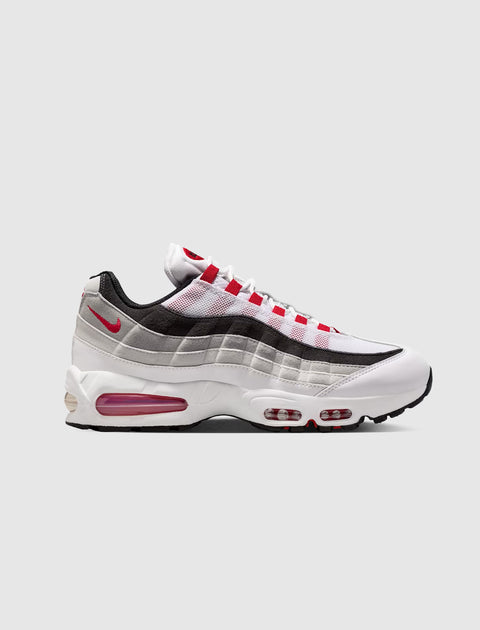 White, grey and red men's streetwear sneaker with visible air cushioning and gradient side panels