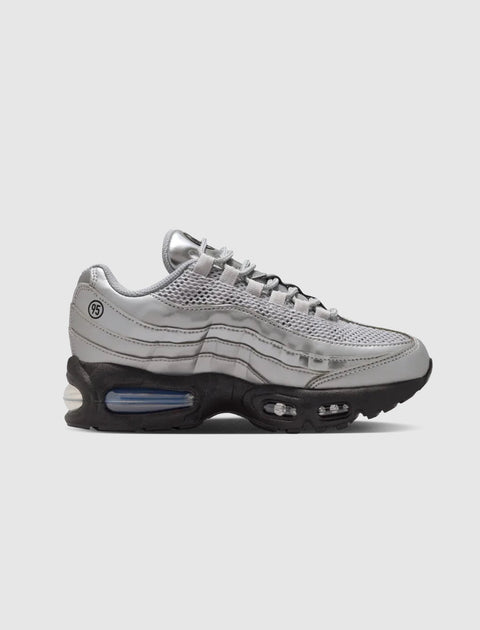 Silver mesh and leather sneaker with black sole, visible air bubble, side profile view