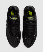 Black Nike Air Max 95 sneakers with spider and web Halloween accents, neon branding, top view