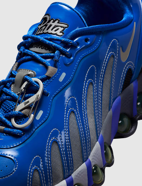 Blue men's streetwear sneaker with Patta branding, mesh panels, and unique outsole design