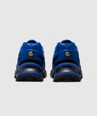 Rear view of blue men's sneakers with Air Max logo and black details on a grey background.