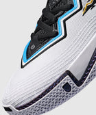 Close-up of a men's white and black sneaker with textured mesh, blue and gold accents, and detailed sole.