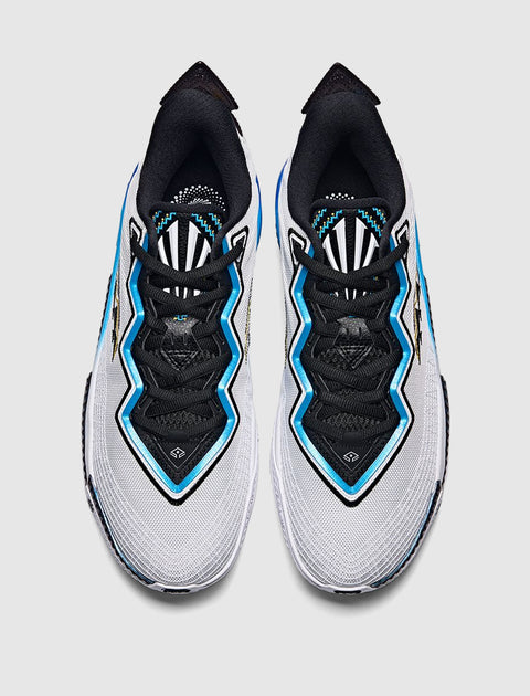 Top view of white, black, and blue men's streetwear sneakers on gray background