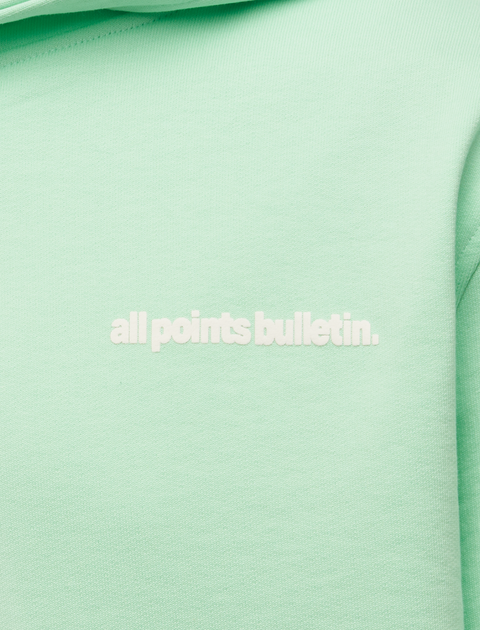 Mint green hoodie with 'all points bulletin.' text chest detail, men's streetwear