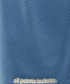 Blue mesh athletic shorts with 'all points bulletin.' white text near hem