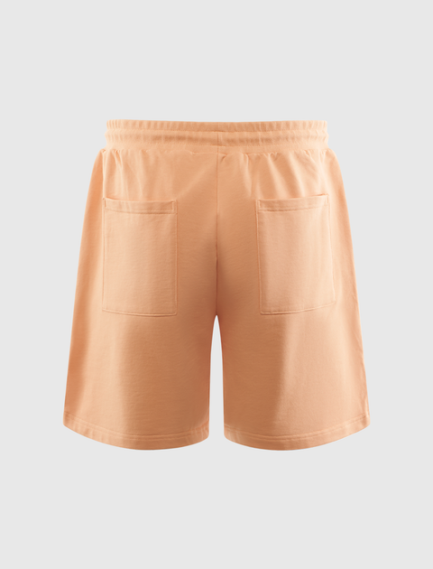 Back view of peach pink men's streetwear shorts with two rear pockets