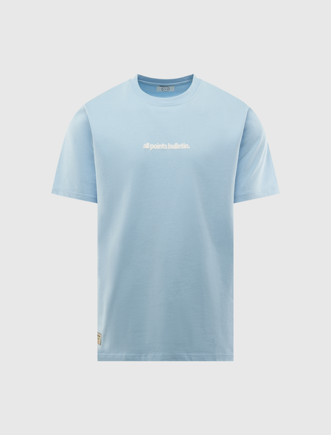 Light blue men's streetwear t-shirt with white 'all points bulletin.' text on front