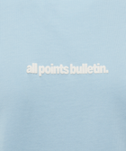Light blue men's streetwear t-shirt with white embroidered all points bulletin text logo