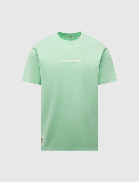 Mint green men's streetwear t-shirt with 'all points bulletin.' text on chest