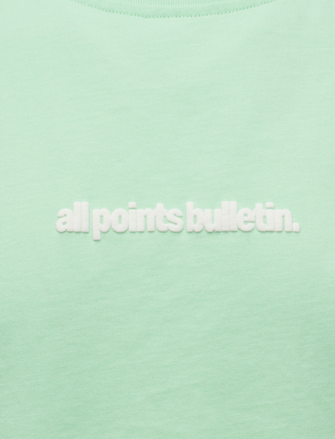 Mint green streetwear t-shirt with 'all points bulletin.' white embroidery on chest